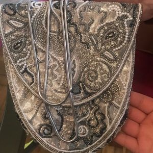 A Hashimoto gray bag , silver chain